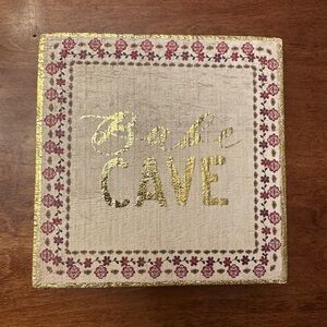 Gold and pink wooden Babe Cave Sign